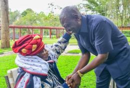 File Image of President William Ruto with the late Field-Marshal Muthoni wa Kirima at Sagana State Lodge, Nyeri County.